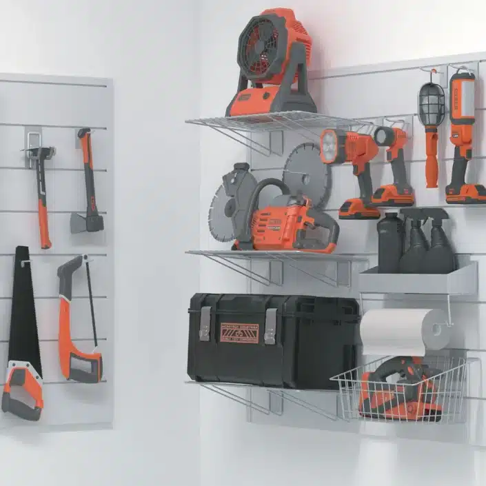 Slat wall storage with various tools hanging from them.