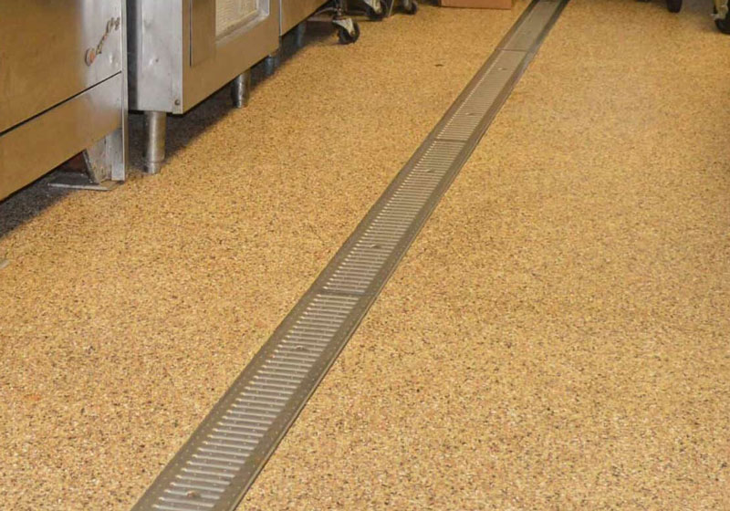 quartz Industrial kitchen with heavy duty concrete coating applied.